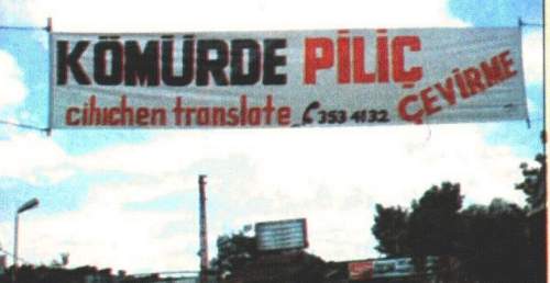 Picture of a sign: Kömürde Piliç Çevirme / cihichen translate